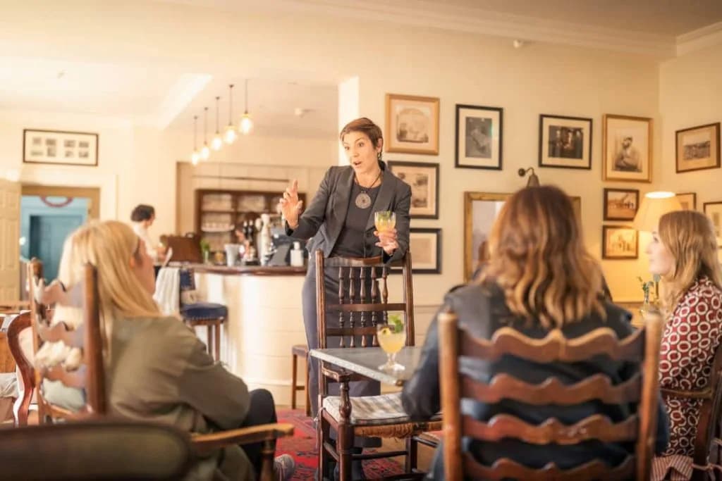 Stephanie J Moore speaking at a wellbeing workshop